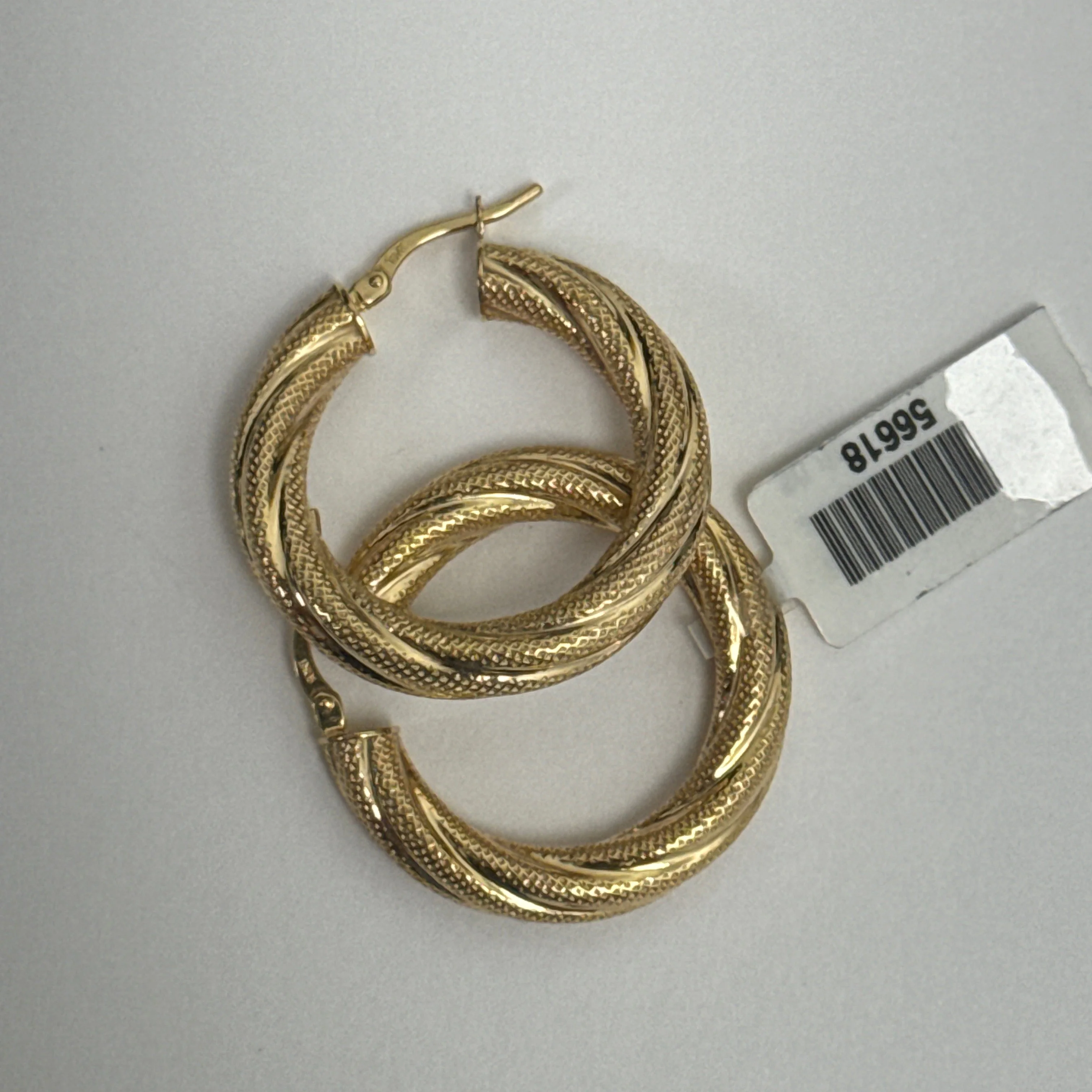 10k Textured Twist Hoop Earrings in Yellow Gold - Image 2
